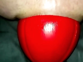 Huge 12 cm wide red football sliding out of my ass up close in slow motion